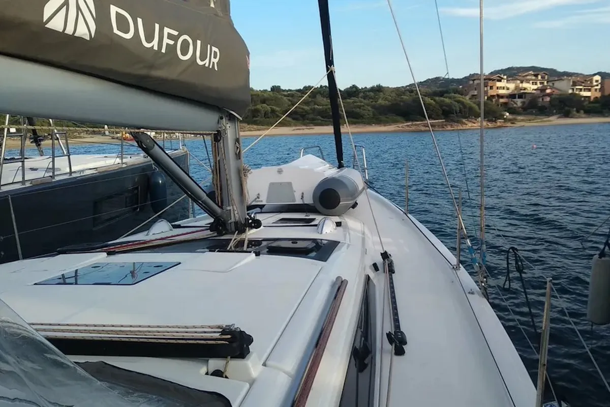Exterior view of Thymus, a Dufour 430 sailboat at Olbia, Italy