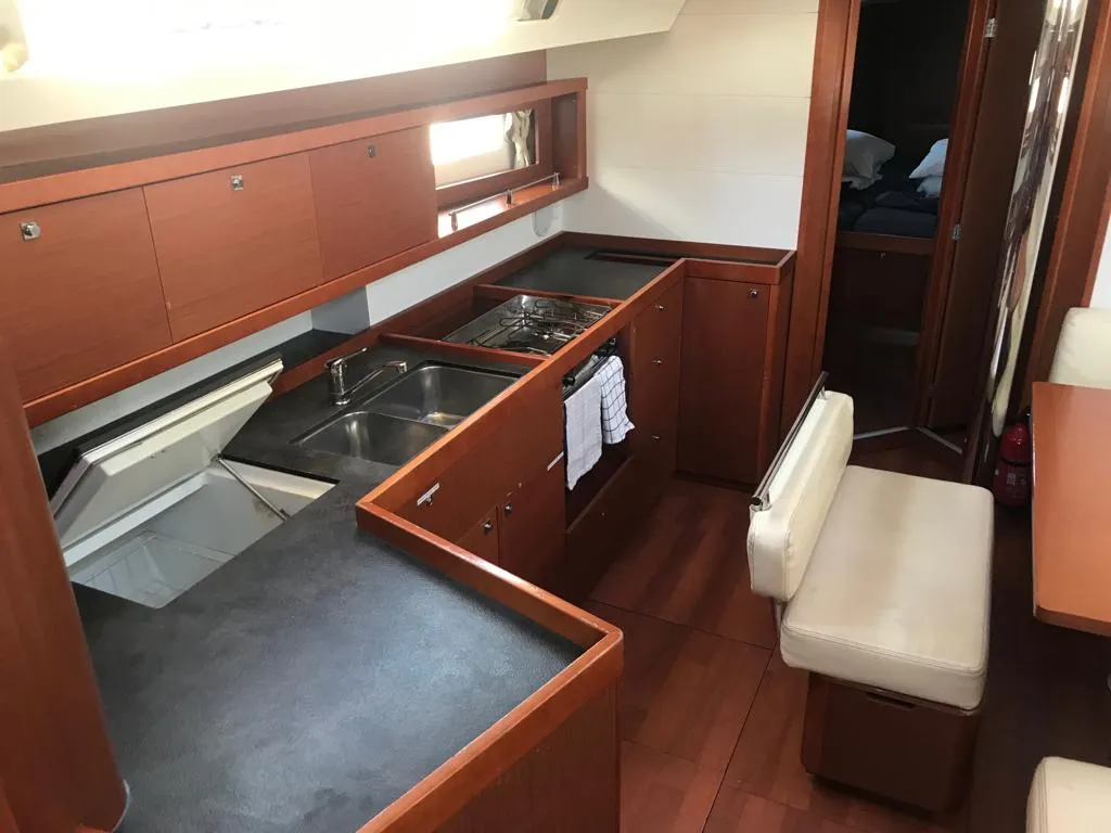 Galley of Alboran Gin Tonic, a Beneteau Oceanis 45 sailboat at es Jonquet, Spain