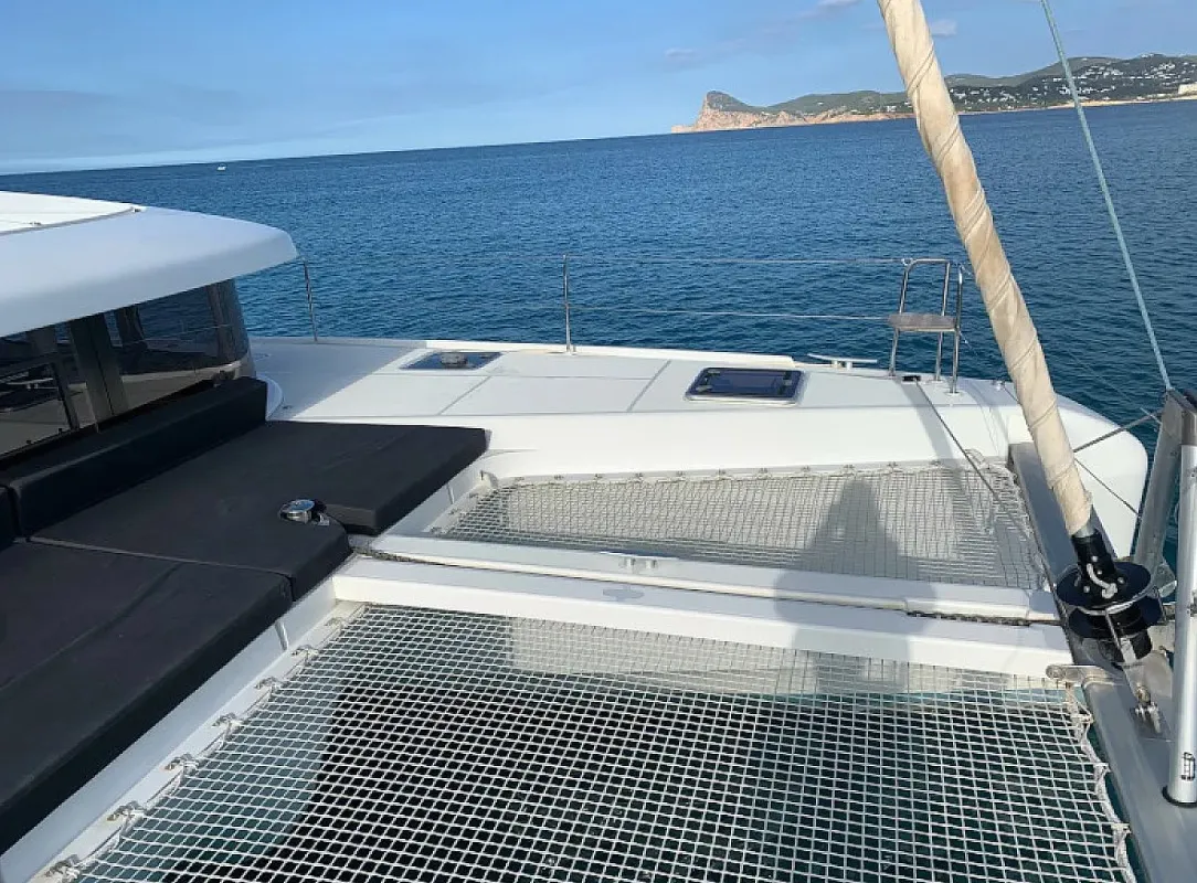 Exterior view of PASCAL, a Lagoon 42 catamaran at Sant Antoni de Portmany, Spain
