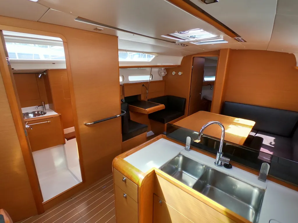 Salon of Piedanlo II, a Jeanneau Sun Odyssey 409 sailboat at Olbia, Italy