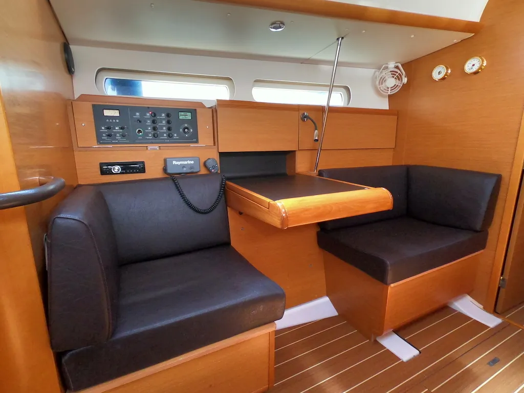 Salon of Piedanlo II, a Jeanneau Sun Odyssey 409 sailboat at Olbia, Italy