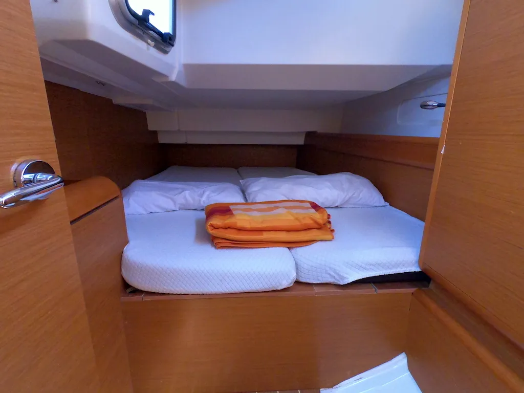 Cabin on Piedanlo II, a Jeanneau Sun Odyssey 409 sailboat at Olbia, Italy