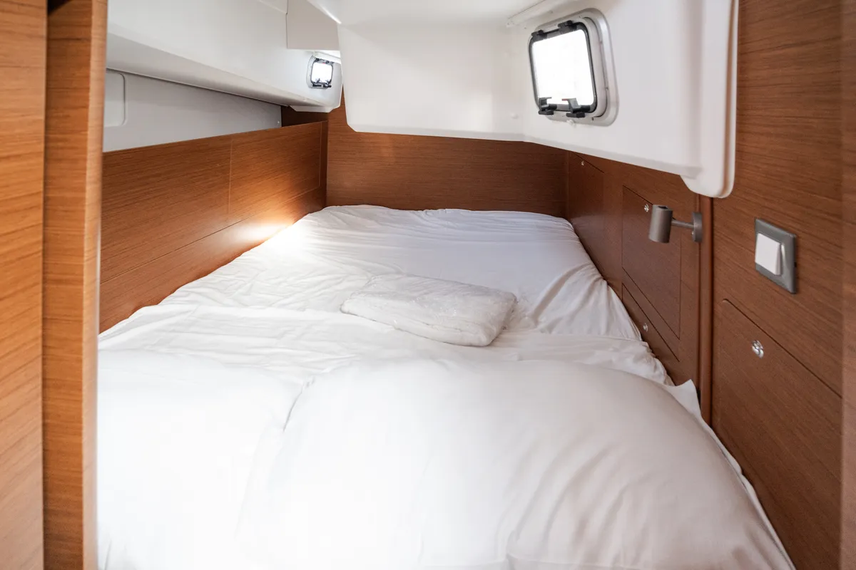 Cabin on Pheia - Comfort line, a Jeanneau Sun Odyssey 410 sailboat at Rosignano Solvay, Italy