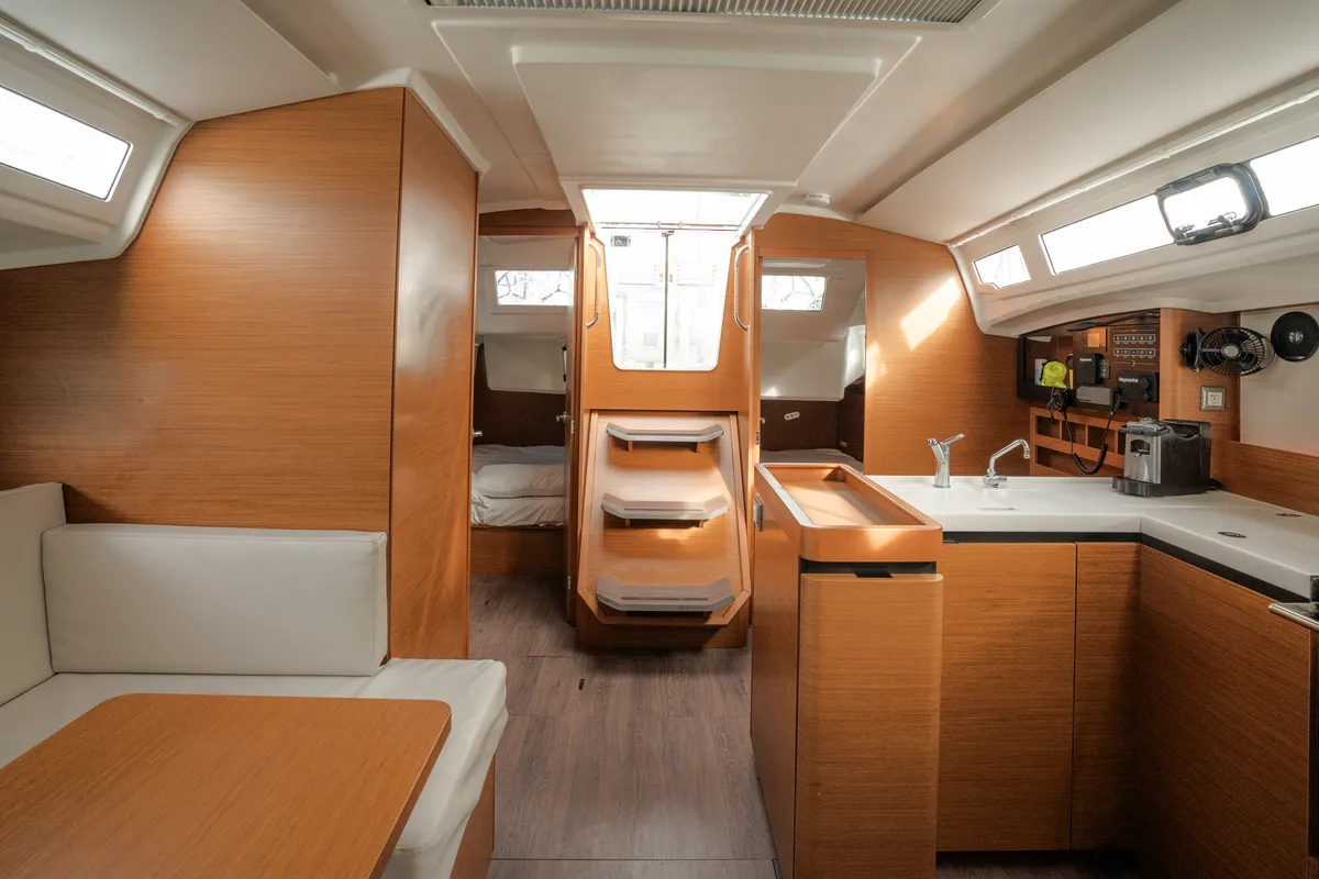 Salon of Pheia - Comfort line, a Jeanneau Sun Odyssey 410 sailboat at Rosignano Solvay, Italy