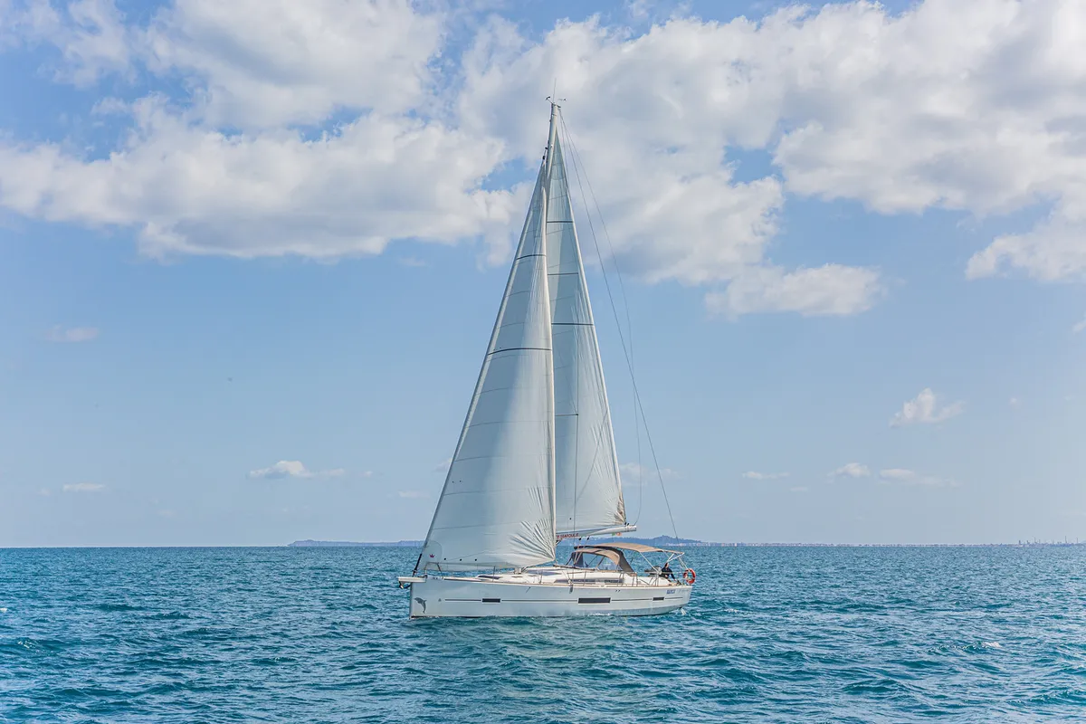 Exterior view of Dream Planet, a Dufour 520 Grand Large sailboat at Tonnarella, Italy