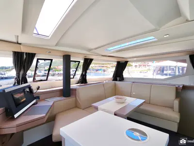 Salon of Orsa 3, a Fountaine Pajot Saona 47 Quintet catamaran at Cannigione, Italy