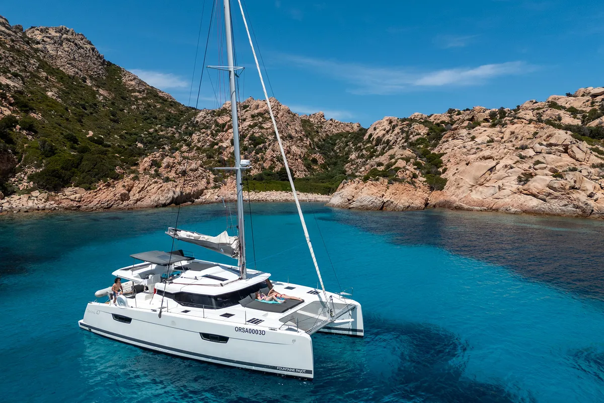 Exterior view of Orsa 3, a Fountaine Pajot Saona 47 Quintet catamaran at Cannigione, Italy