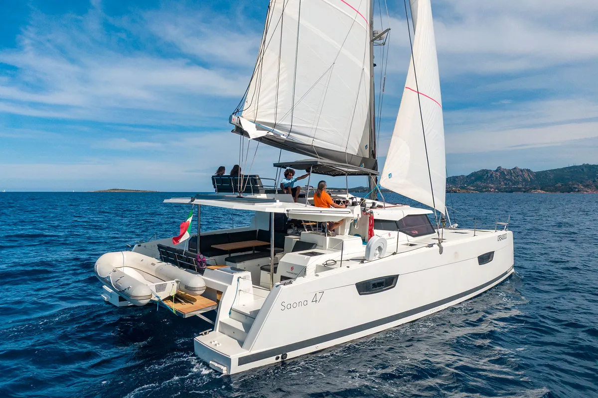 Exterior view of Orsa 3, a Fountaine Pajot Saona 47 Quintet catamaran at Cannigione, Italy