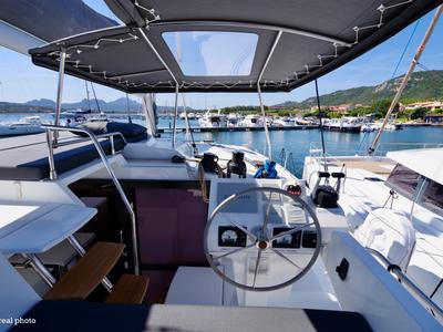 Cockpit of Orsa 3, a Fountaine Pajot Saona 47 Quintet catamaran at Cannigione, Italy