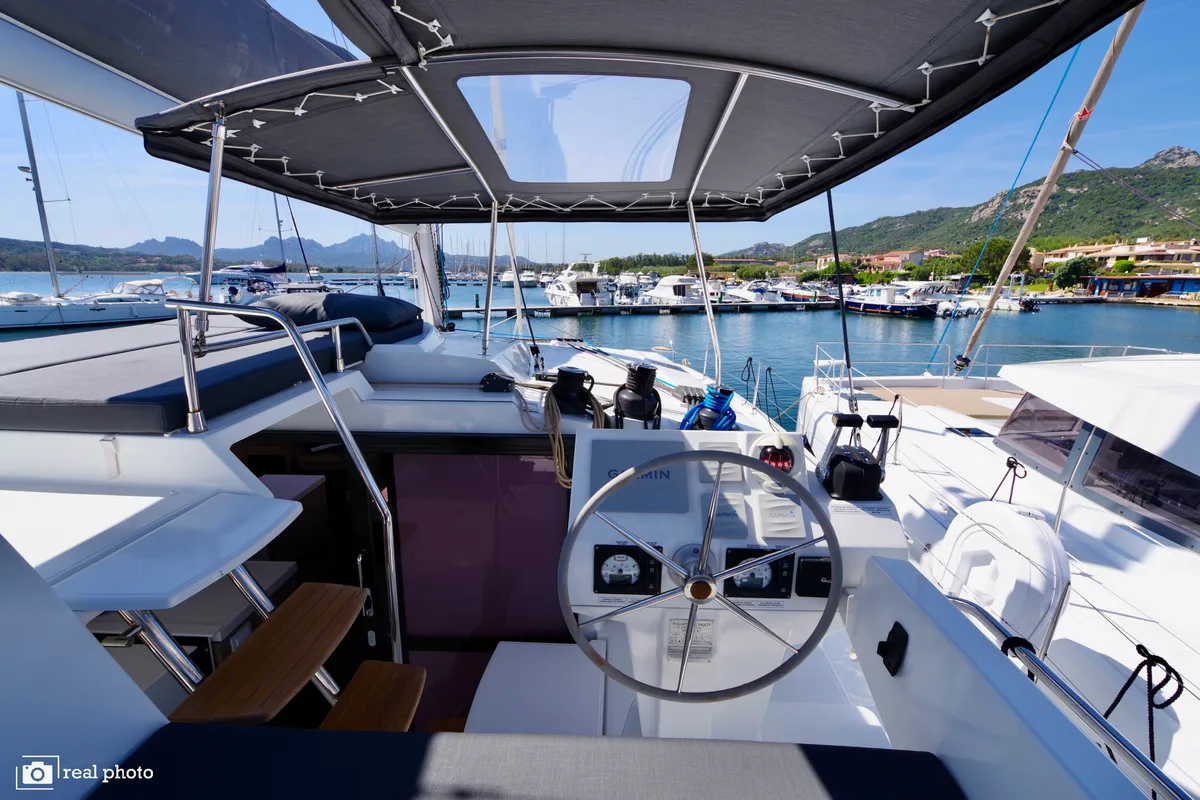 Cockpit of Orsa 3, a Fountaine Pajot Saona 47 Quintet catamaran at Cannigione, Italy