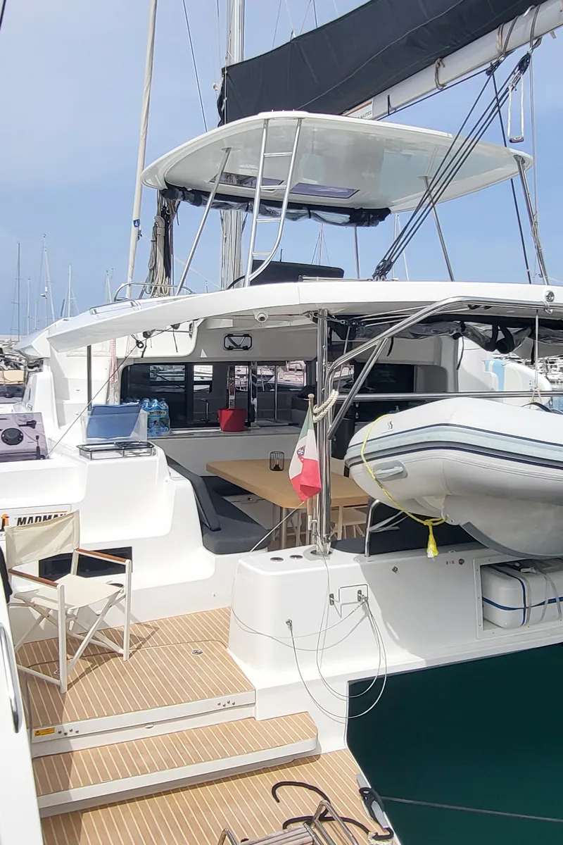 Exterior view of Blue Moon, a Lagoon 46 catamaran at Capo d'Orlando, Italy