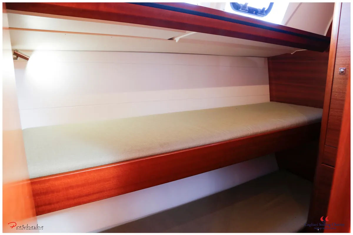 Cabin on Cala di Volpe, a Dufour 520 Grand Large sailboat at Cagliari, Italy