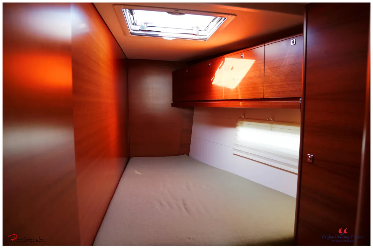 Cabin on Cala di Volpe, a Dufour 520 Grand Large sailboat at Cagliari, Italy
