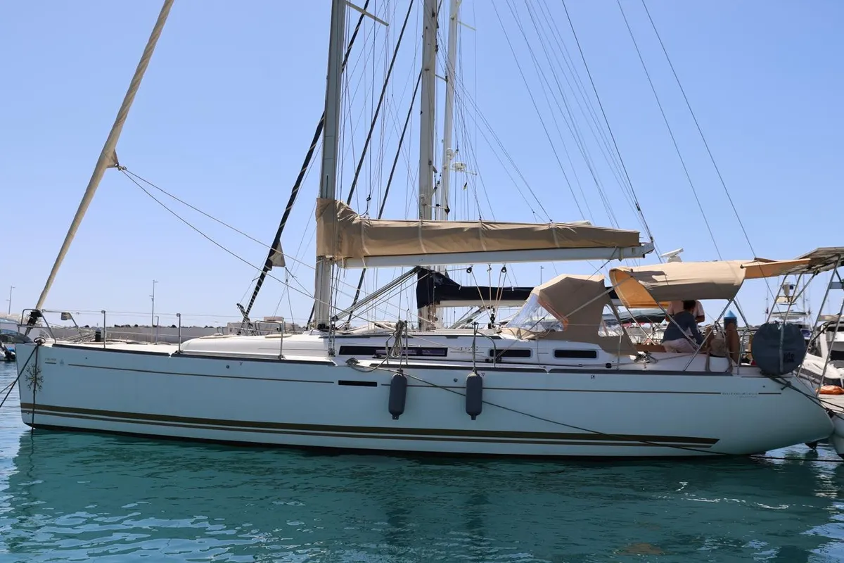 Exterior view of Keep Sailing VIII, a Dufour 455 Grand Large sailboat at Santa Eulària des Riu, Spain