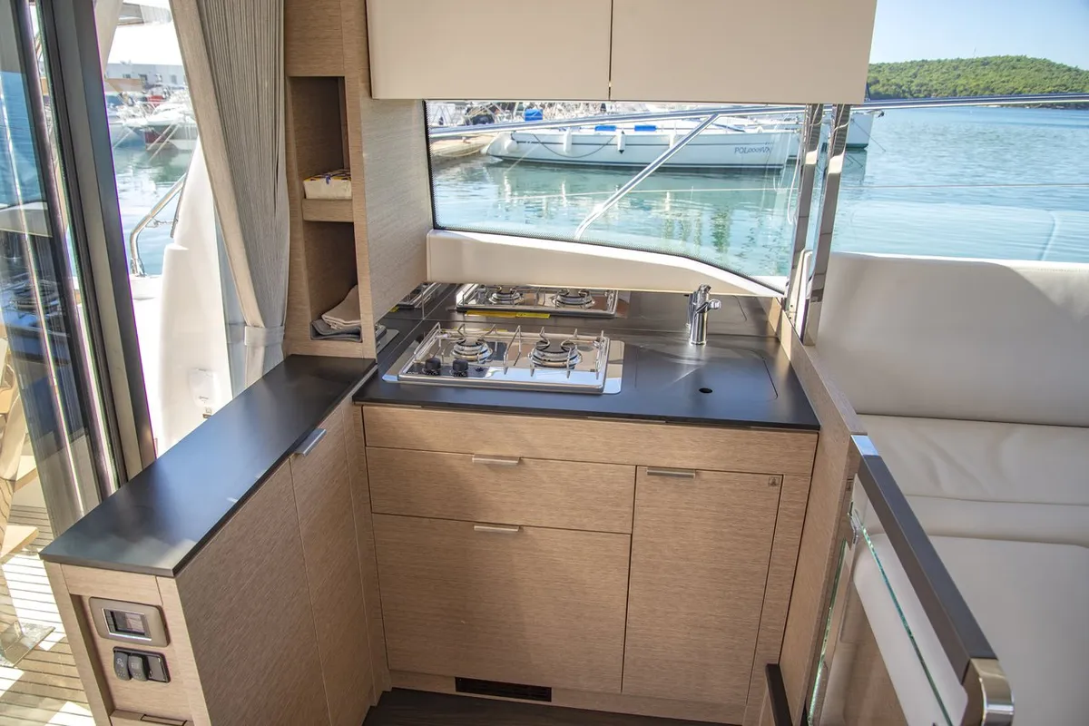Deck of NN, a Jeanneau Prestige 420 Fly motor yacht at Grad Pula, Croatia