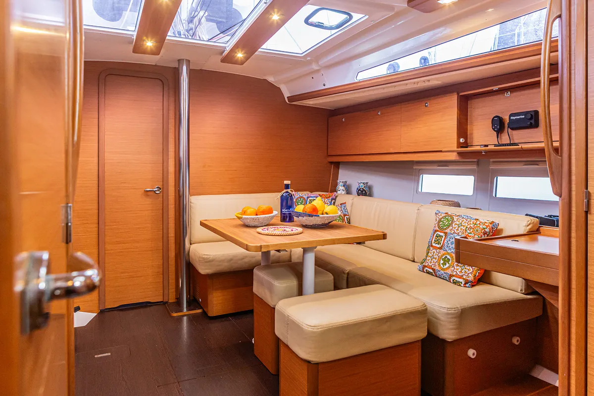 Salon of Sympathy Planet, a Dufour 390 Grand Large sailboat at Palermo, Italy