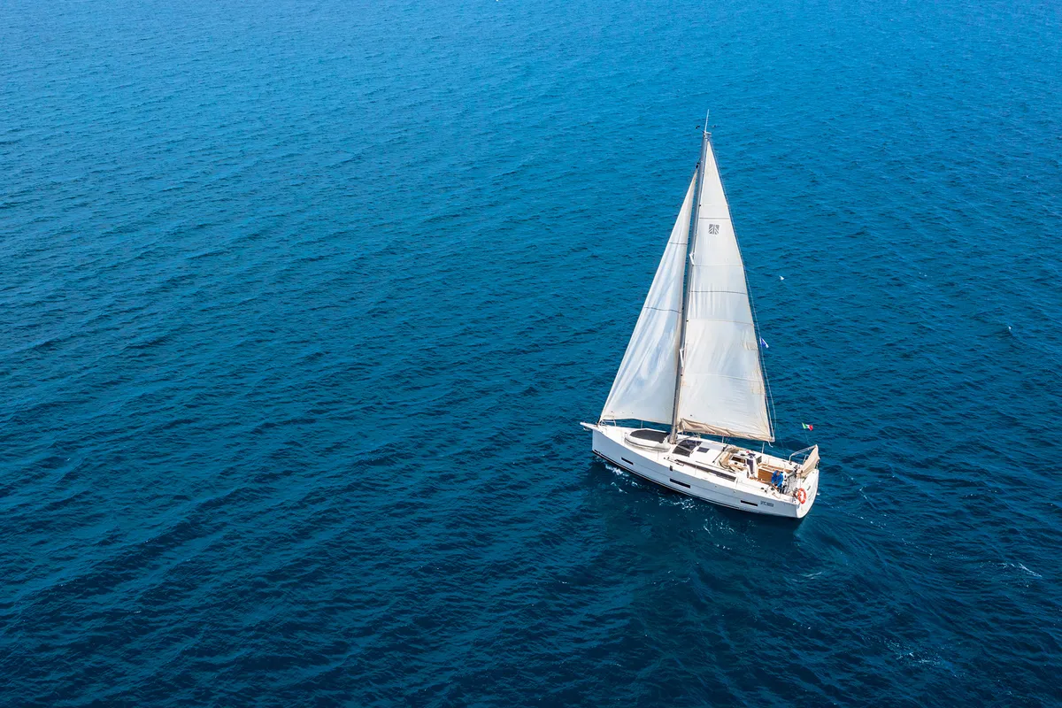 Exterior view of Sympathy Planet, a Dufour 390 Grand Large sailboat at Palermo, Italy