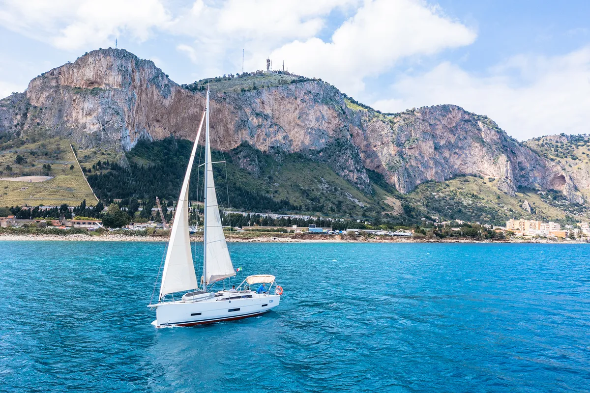 Exterior view of Sympathy Planet, a Dufour 390 Grand Large sailboat at Palermo, Italy