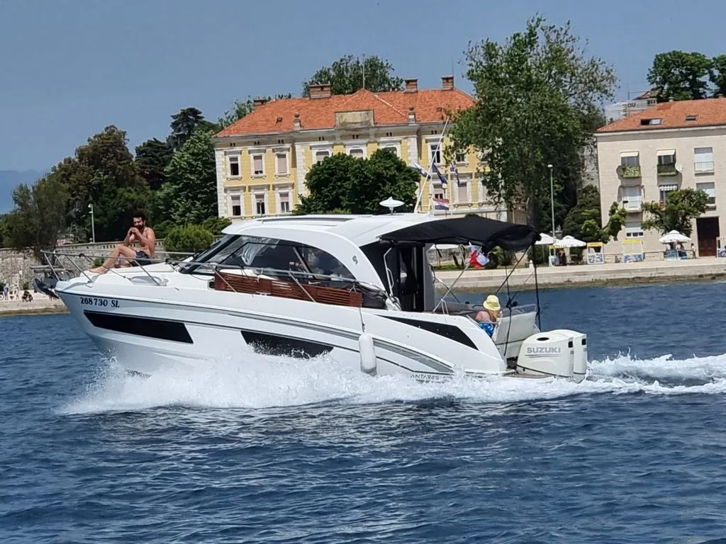 Exterior view of Queen Korina, a Beneteau Antares 9 OB motorboat at Zadar, Croatia