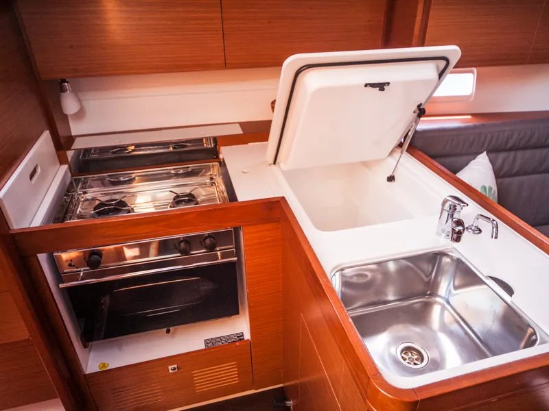 Galley of IDA (new sails 2023.), a Dufour 350 Grand Large sailboat at Primošten, Croatia