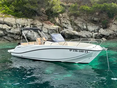 Exterior view of Firulais, a Quicksilver Activ 675 Open motorboat at Roses, Spain