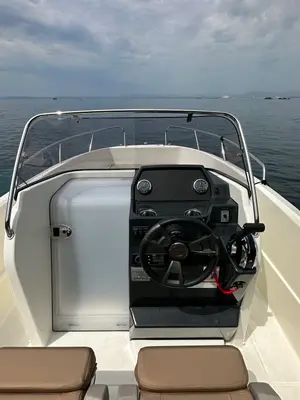 Cockpit of Firulais, a Quicksilver Activ 675 Open motorboat at Roses, Spain