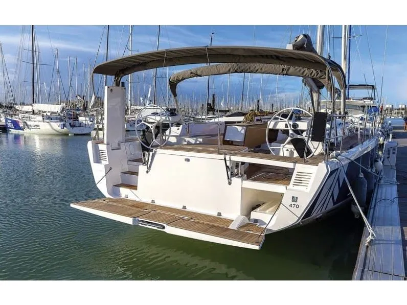 Exterior view of Dimitra, a Dufour 470 sailboat at Agios Stefanos, Greece