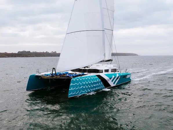 Exterior view of Avel Vaez, a Marsaudon Composites ORC 57 catamaran at Lavreotiki Municipal Unit, Greece