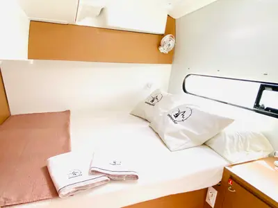 Cabin on OLOKUM Mallorca BAREBOAT, a Excess 11 catamaran at Port d'Andratx, Spain