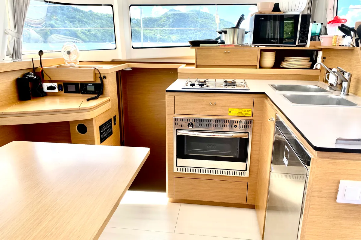 Galley of OLOKUM Mallorca BAREBOAT, a Excess 11 catamaran at Port d'Andratx, Spain