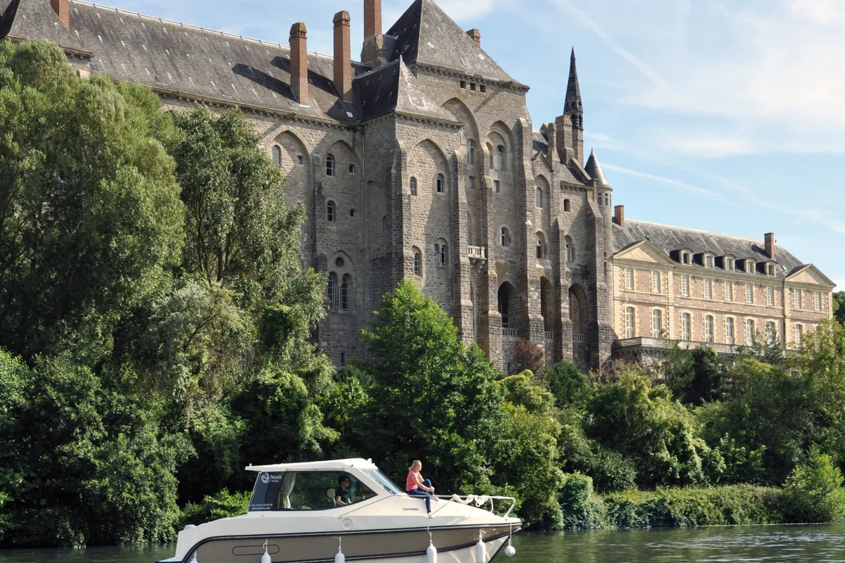 Exterior view of Solfège, a Nicols Sedan Primo motorboat at Sablé-sur-Sarthe, France