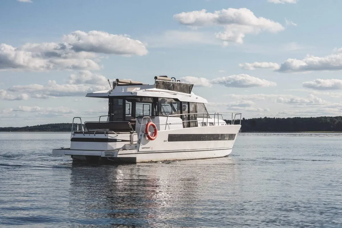 Exterior view of Sirina, a Northman 1200 motorboat at Sztynort, Poland