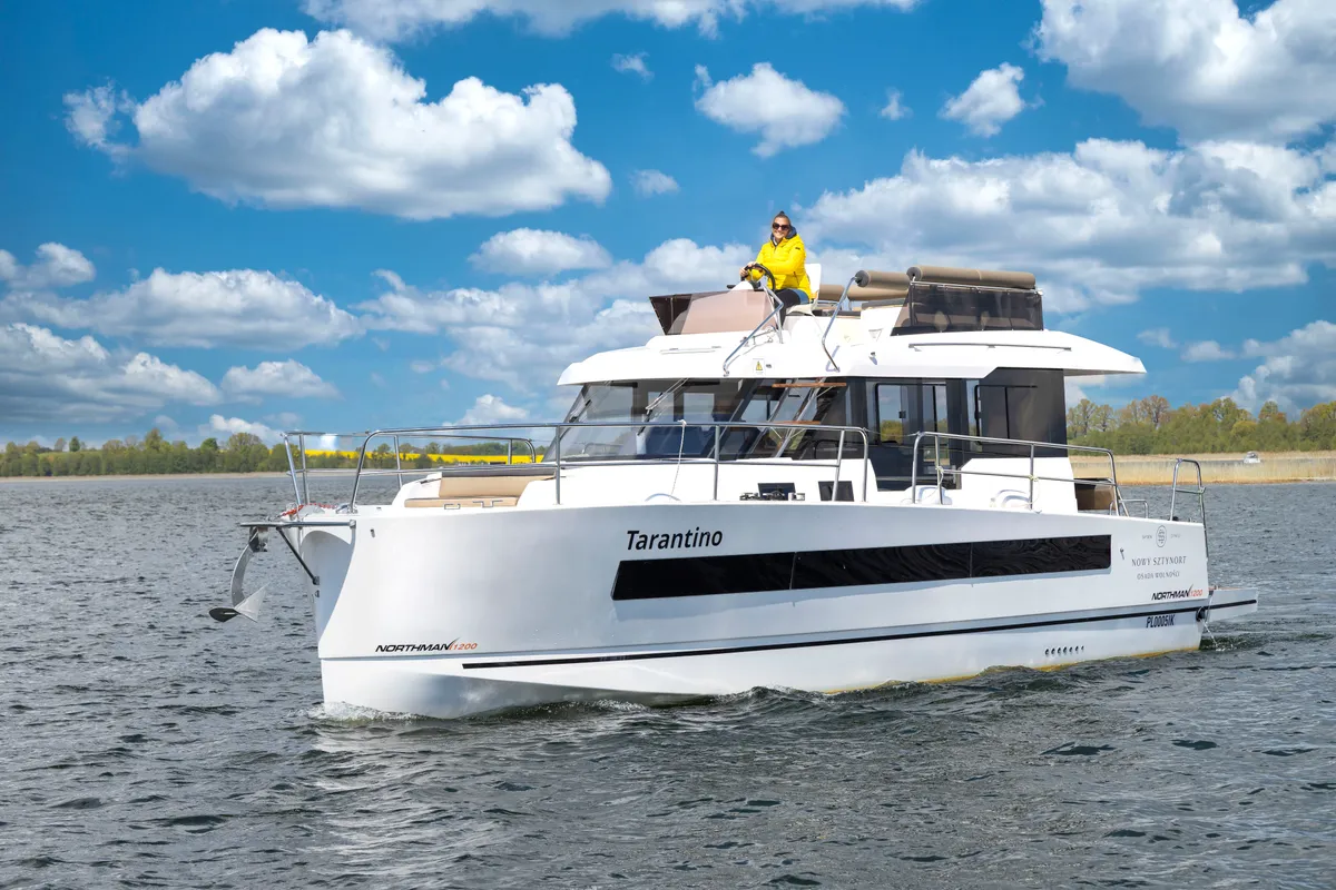 Exterior view of Sirina, a Northman 1200 motorboat at Sztynort, Poland