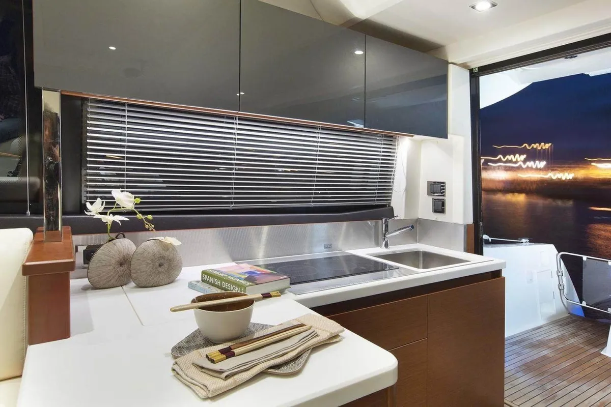 Galley of Beni, a Prestige 450 motorboat at Giardini Naxos, Italy