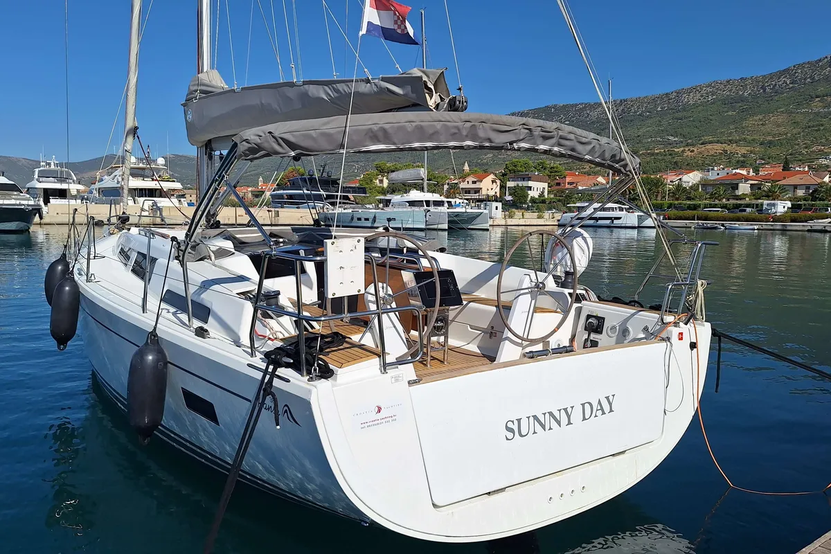 Exterior view of Sunny Day, a Hanse 388 sailboat at Grad Kaštela, Croatia