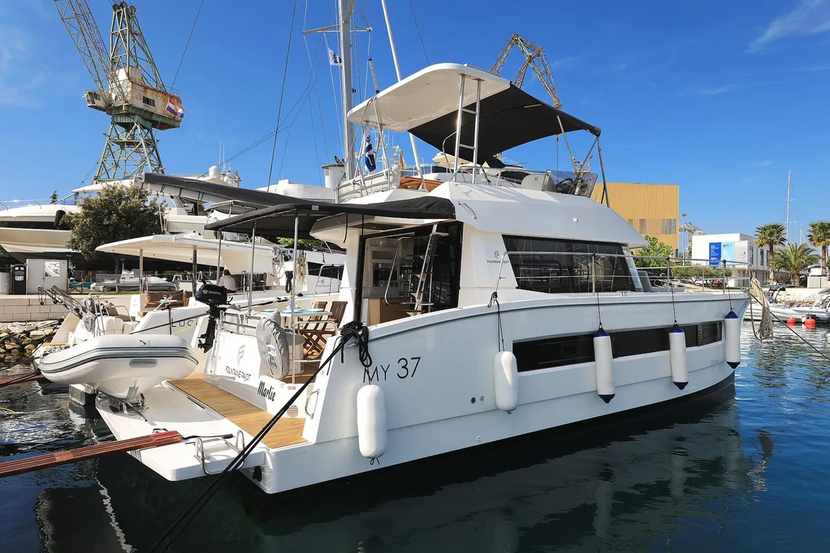 Exterior view of Marlie, a Fountaine Pajot MY 37 catamaran at Grad Trogir, Croatia