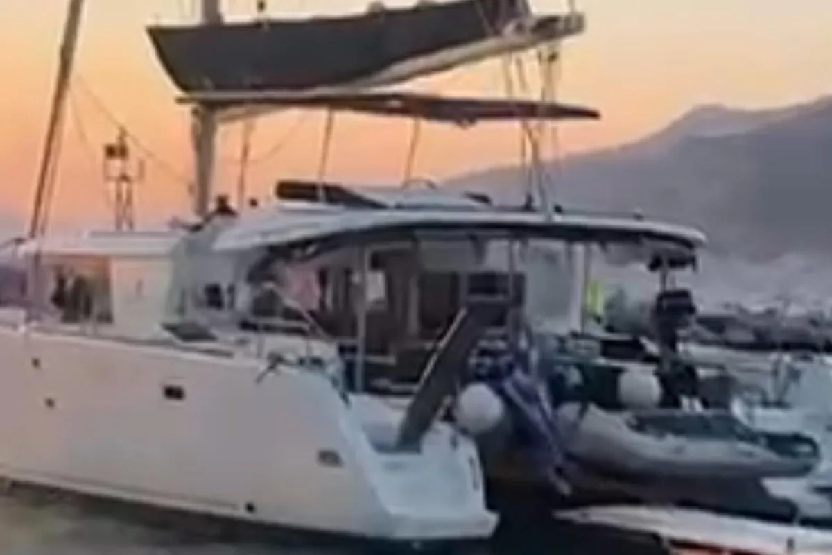 Exterior view of Martina Tres, a Lagoon 450 Fly catamaran at Ibiza, Spain