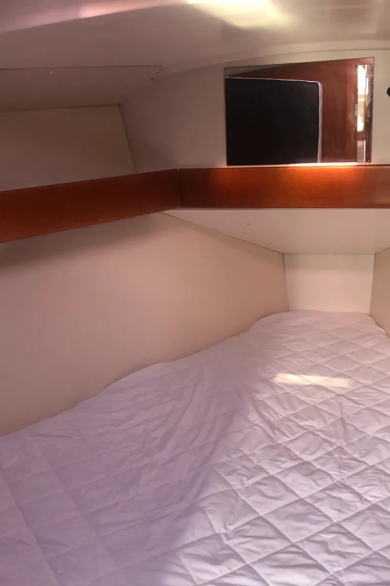 Cabin on Alibi, a Beneteau Oceanis 31 sailboat at Poole, United Kingdom