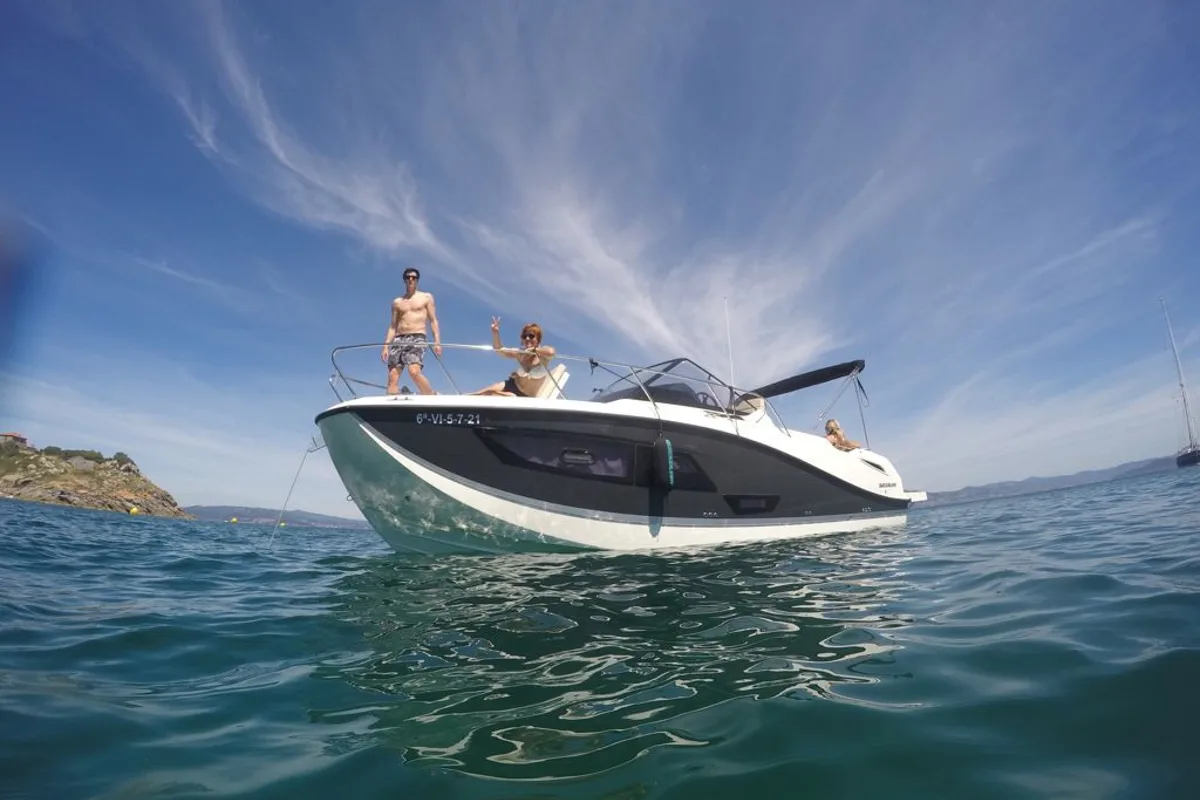 Exterior view of Nuvola, a Quicksilver Activ 875 Sundeck motorboat at Vigo, Spain