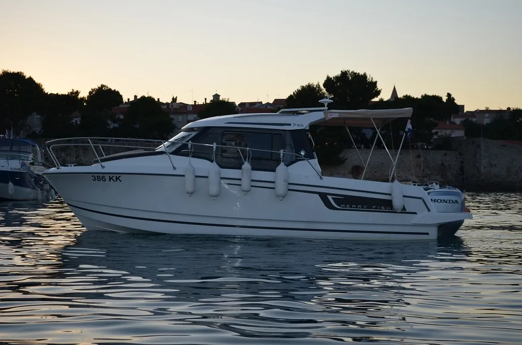Exterior view of MF 795, a Jeanneau Merry Fisher 795 motorboat at Punat, Croatia