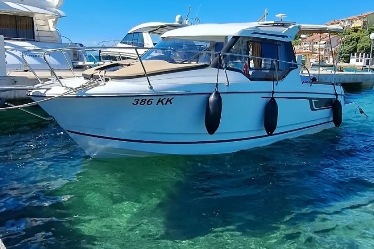 Exterior view of MF 795, a Jeanneau Merry Fisher 795 motorboat at Punat, Croatia