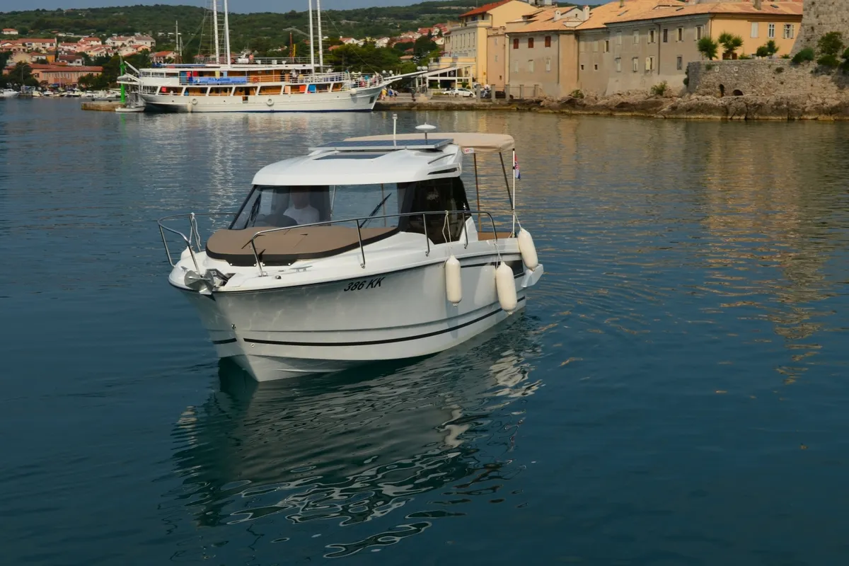 Exterior view of MF 795, a Jeanneau Merry Fisher 795 motorboat at Punat, Croatia