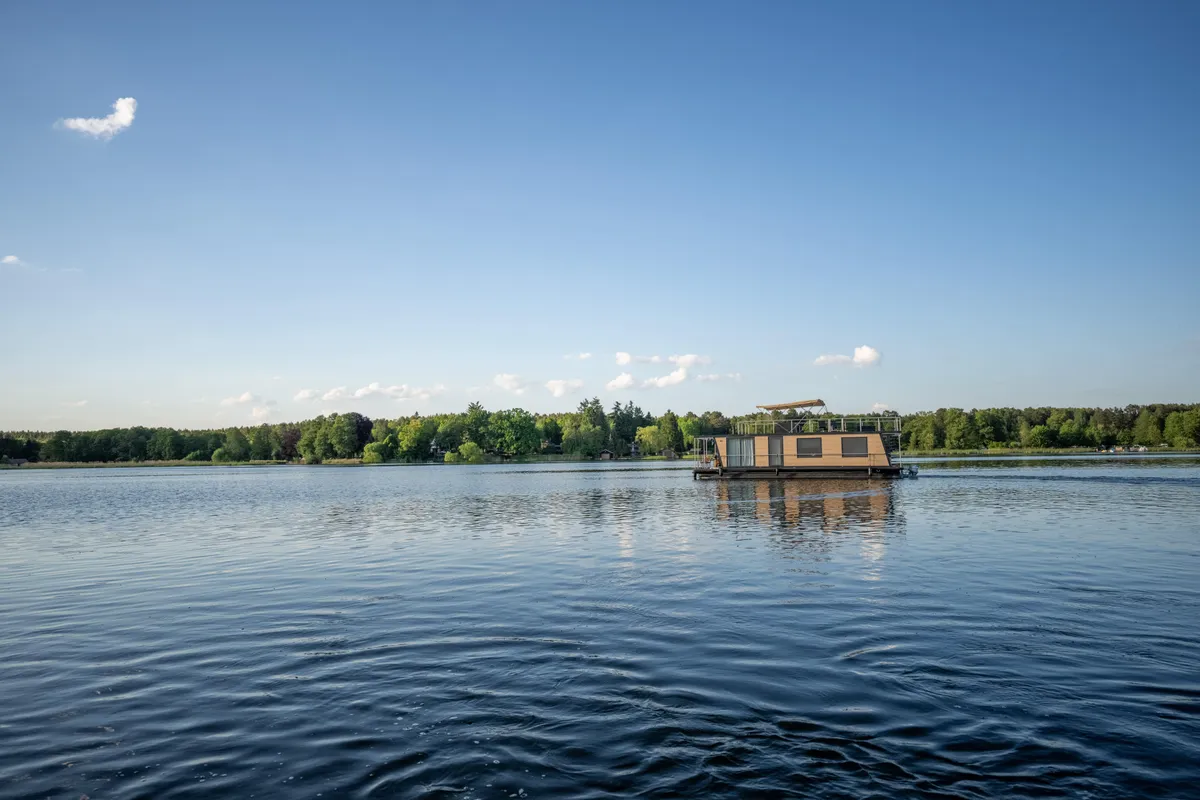 Exterior view of Emsel, a Woma D13 motorboat at Fürstenberg/Havel, Germany