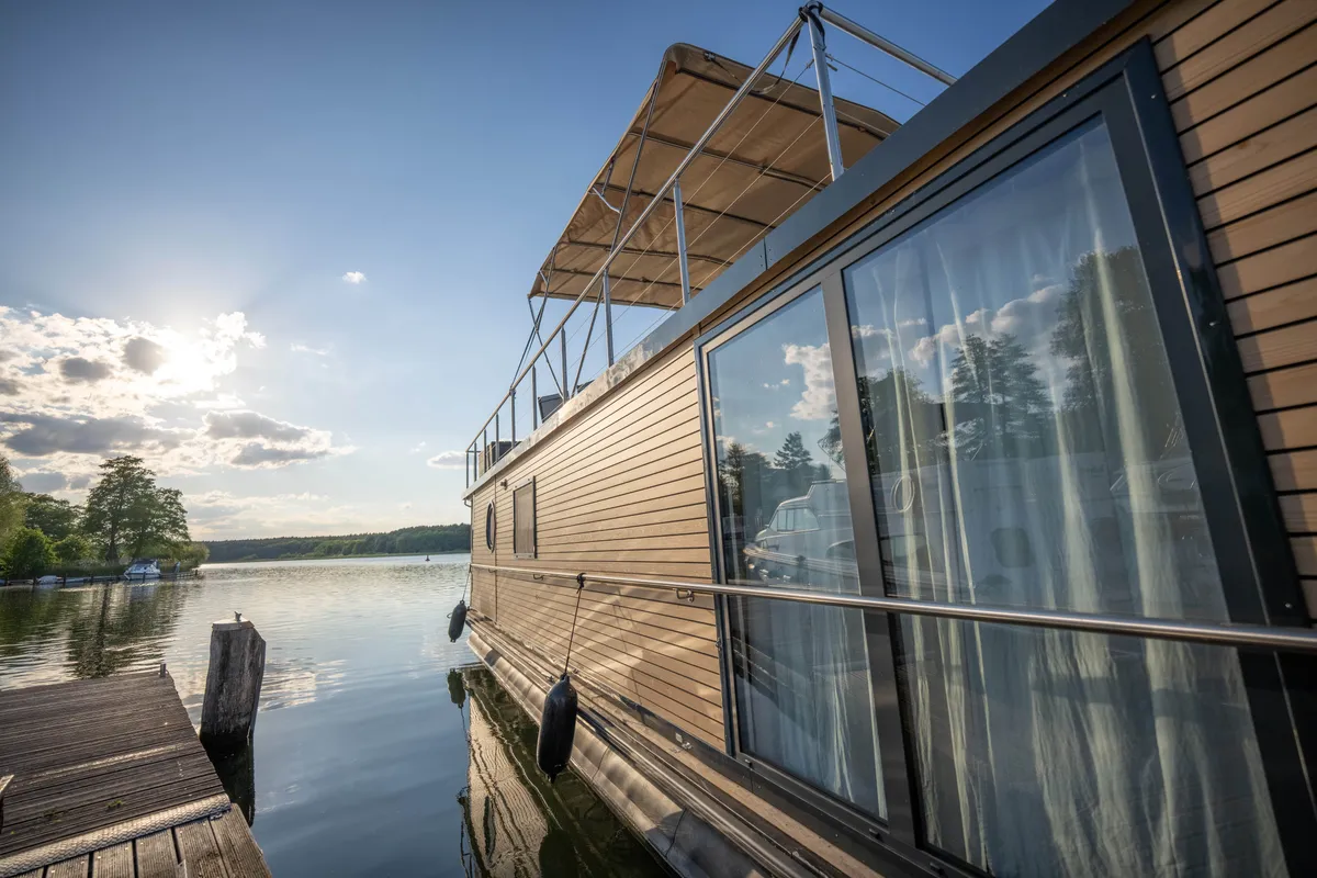 Exterior view of Emsel, a Woma D13 motorboat at Fürstenberg/Havel, Germany