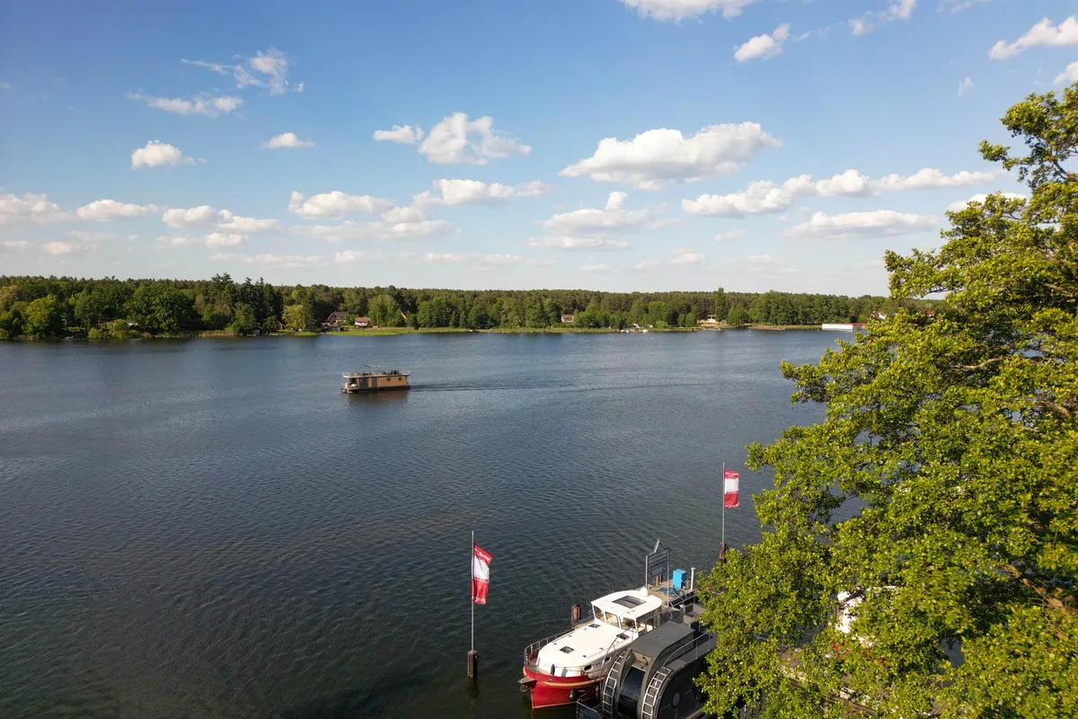Exterior view of Emsel, a Woma D13 motorboat at Fürstenberg/Havel, Germany