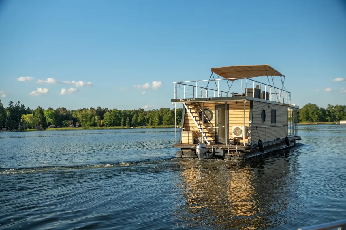 Exterior view of Emsel, a Woma D13 motorboat at Fürstenberg/Havel, Germany