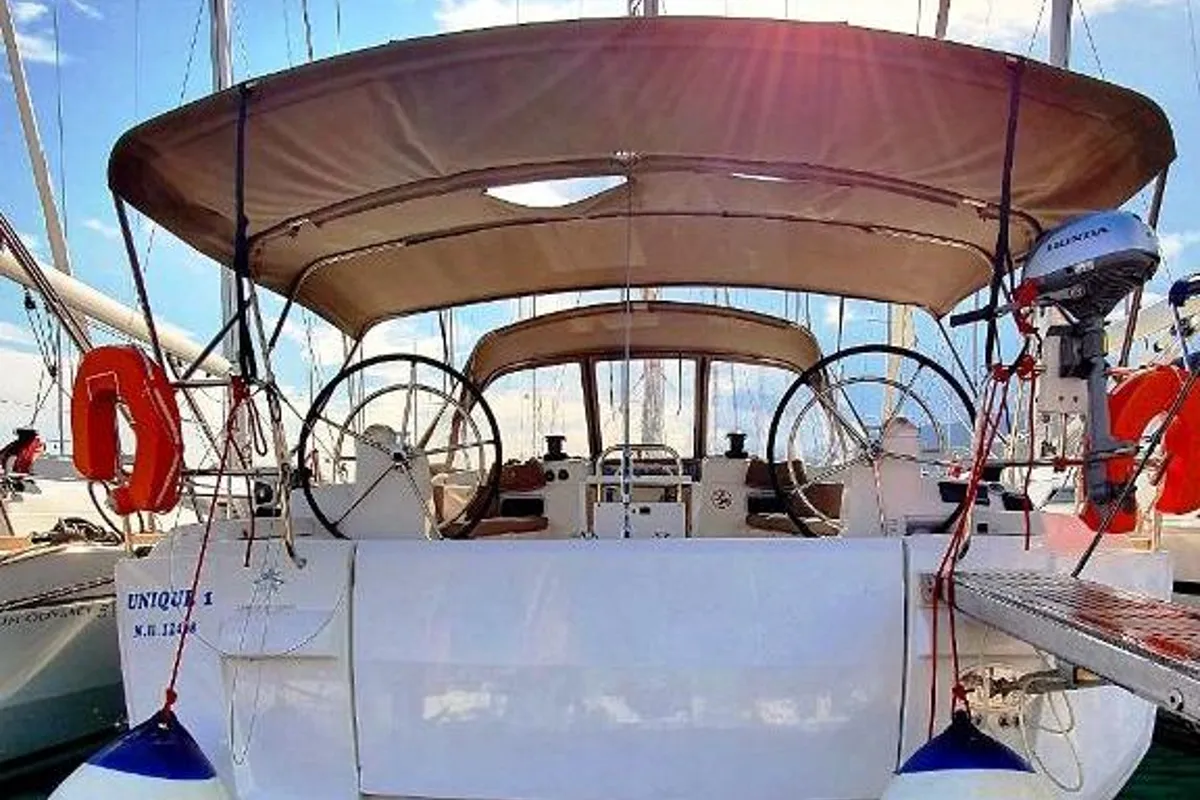 Exterior view of Unique I, a Jeanneau Sun Odyssey 519 sailboat at Municipal Unit of Nea Peramos, Greece