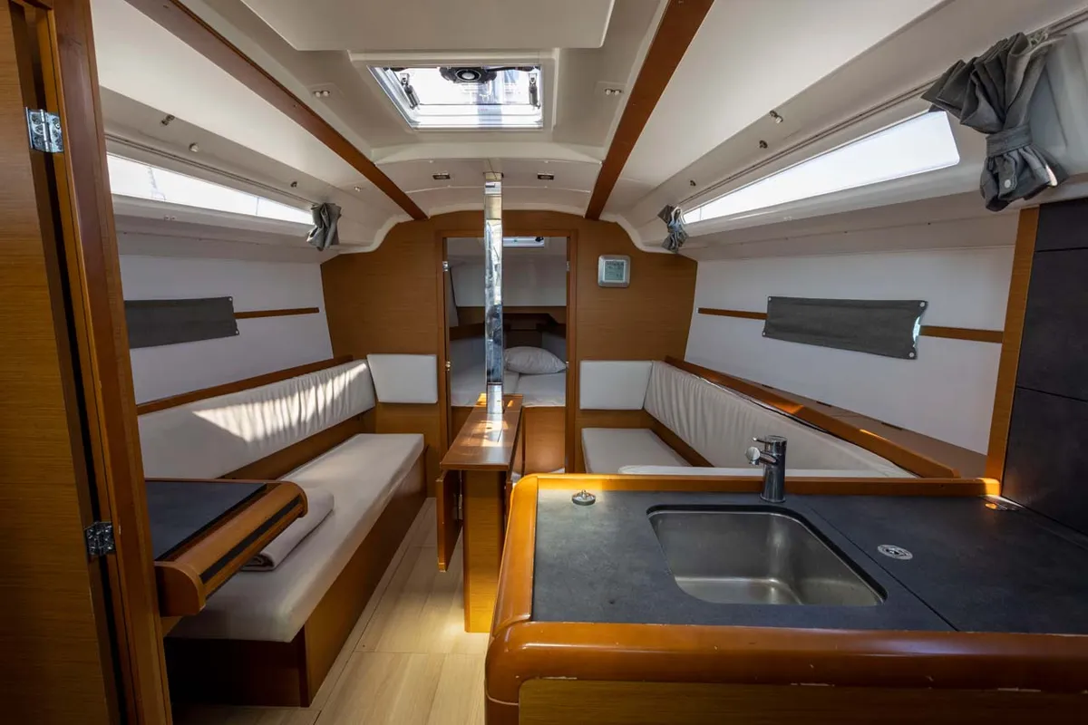 Salon of In The Mood, a Jeanneau Sun Odyssey 349 sailboat at Figari/Golfo Aranci, Italy