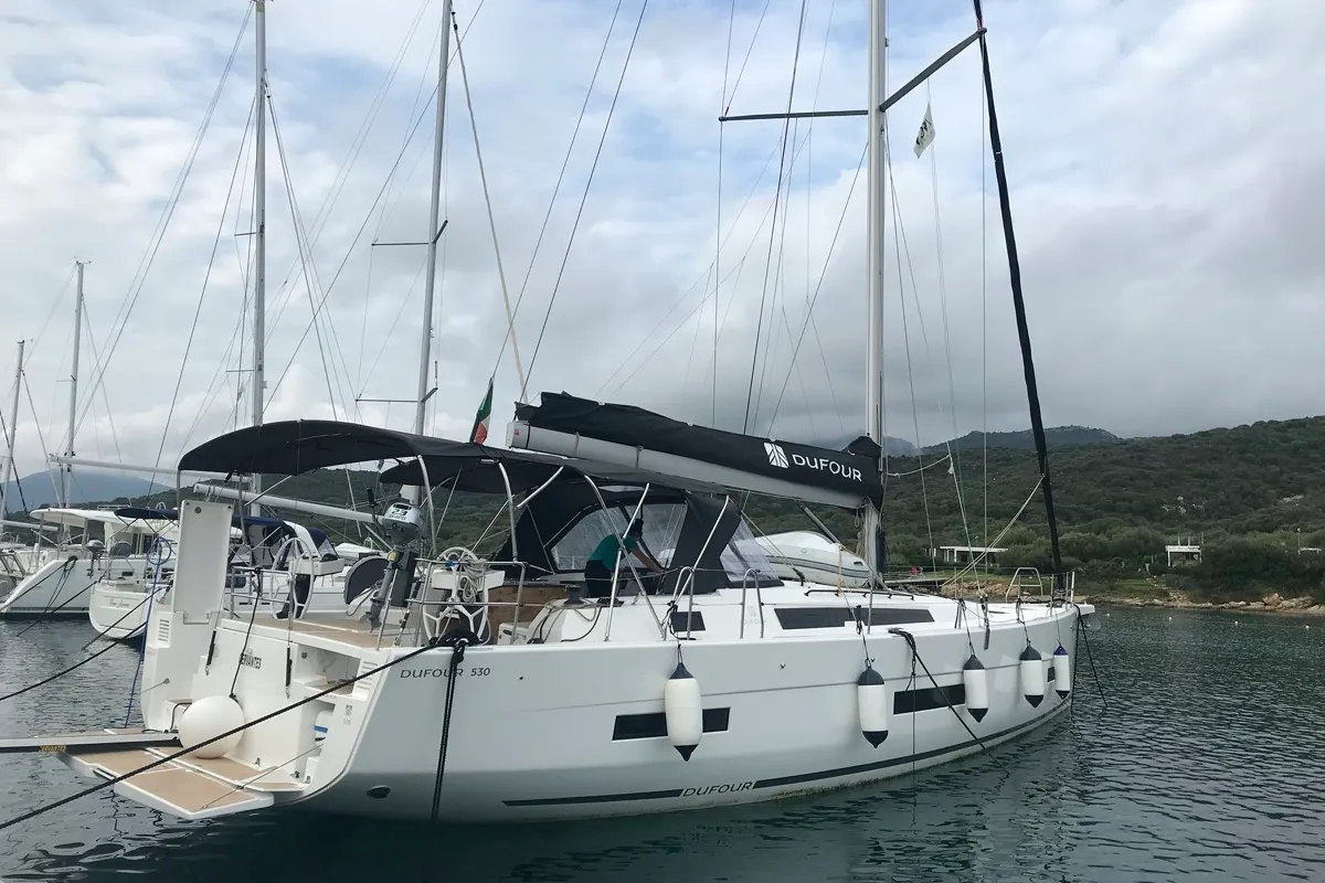 Exterior view of Cervantes, a Dufour 530 sailboat at Olbia, Italy