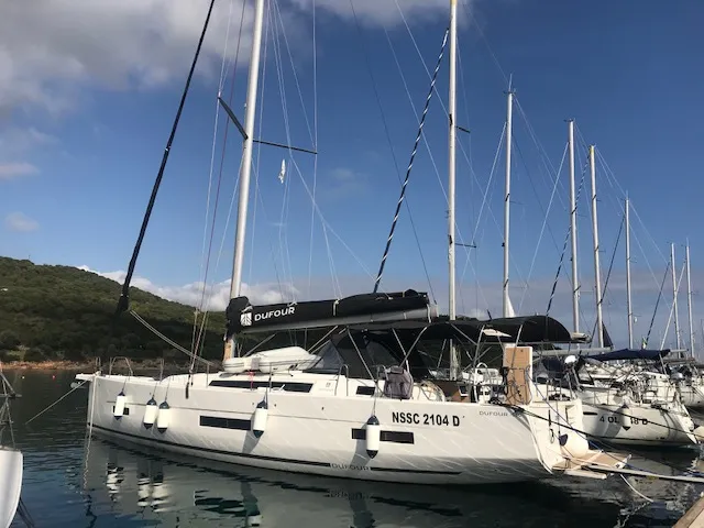 Exterior view of Cervantes, a Dufour 530 sailboat at Olbia, Italy